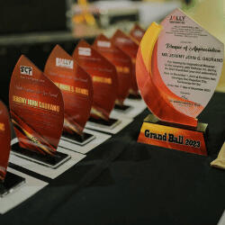 Elegant trophies and awards displayed during the Jally Ventures Grand Ball 2023 recognition ceremony.