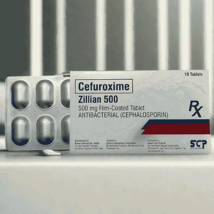 Product photo of Zillian 500 (Cefuroxime Axetil) 500mg film-coated tablets, packaged in blister packs with 10 tablets per box.